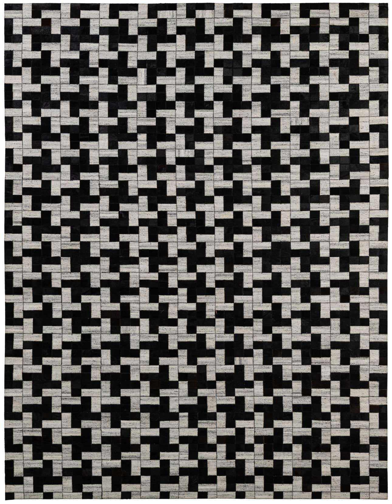 A 5x8 rectangular Cowhide - Patchwork rug in black and gray, featuring a modern geometric pattern of interlocking L-shapes.