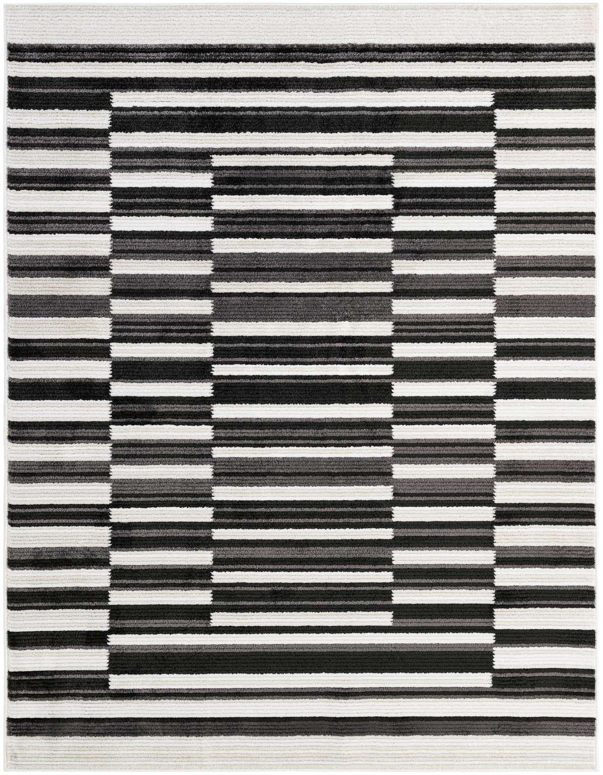 A 5x8 rectangular Rugs.com Odyssey rug featuring a modern black, dark gray, and ivory striped pattern with a textured pile.