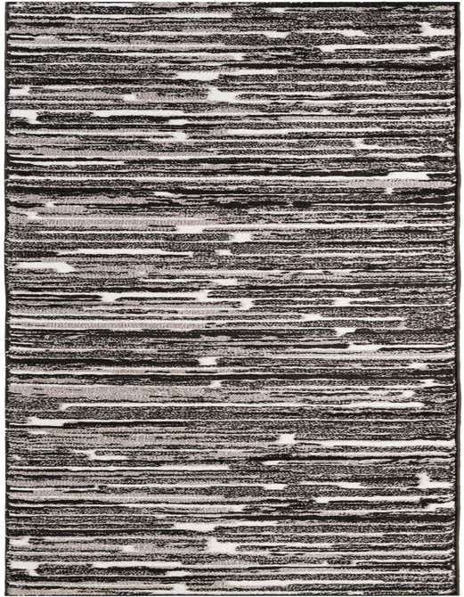 A 10 ft runner rug in black, ivory, and grey with a modern abstract striped pattern, ideal for a hallway.