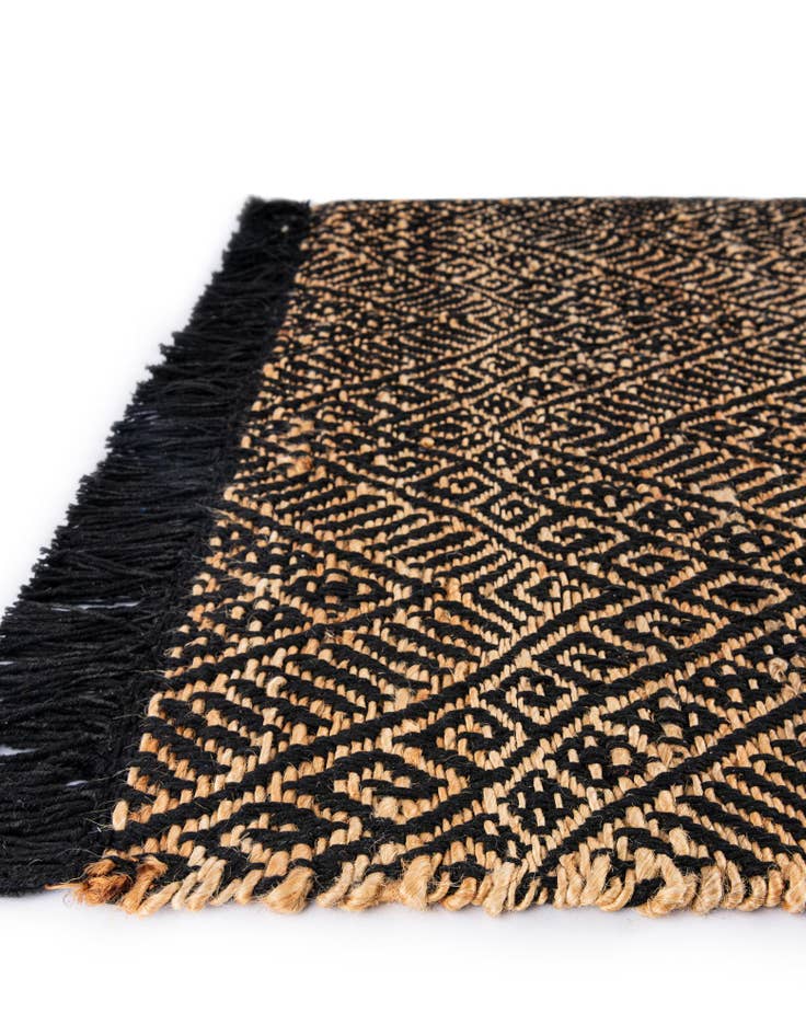 Detail image of  5' 1 x 8'  Hand Braided Jute Rug