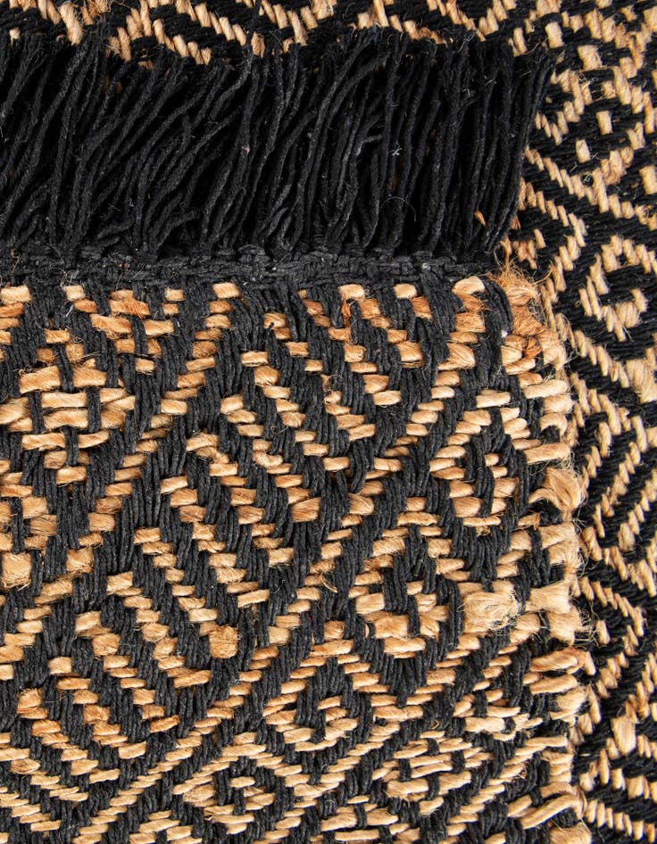 Detail image of  5' 1 x 8'  Hand Braided Jute Rug
