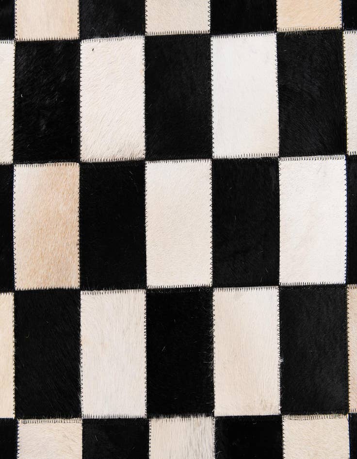 Detail image of  7' 11 x 9' 11 Cowhide Stocks Rug