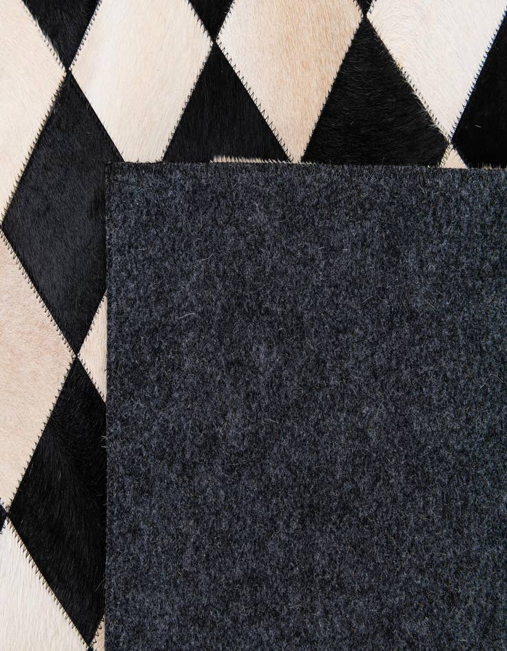 Detail image of  7' 11 x 9' 11 Cowhide Stocks Rug