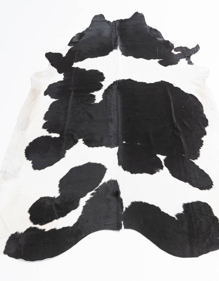 Detail image of  6' 10 x 7' 8 Cowhide Freeform Rug