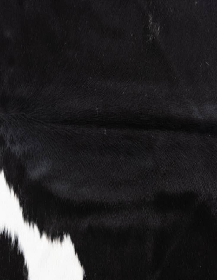 Detail image of  6' 10 x 7' 8 Cowhide Freeform Rug