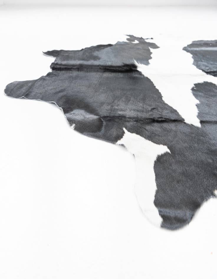 Detail image of  6' 10 x 7' 8 Cowhide Freeform Rug