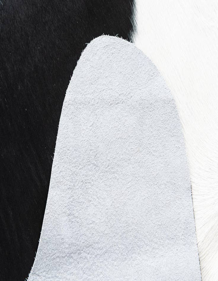 Detail image of  6' 10 x 7' 8 Cowhide Freeform Rug