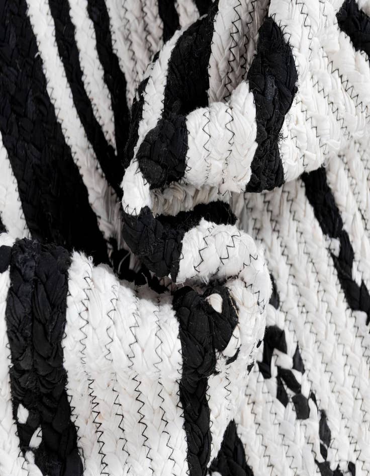 Detail image of  8' x 10'  Hand Braided Chindi Oval Rug