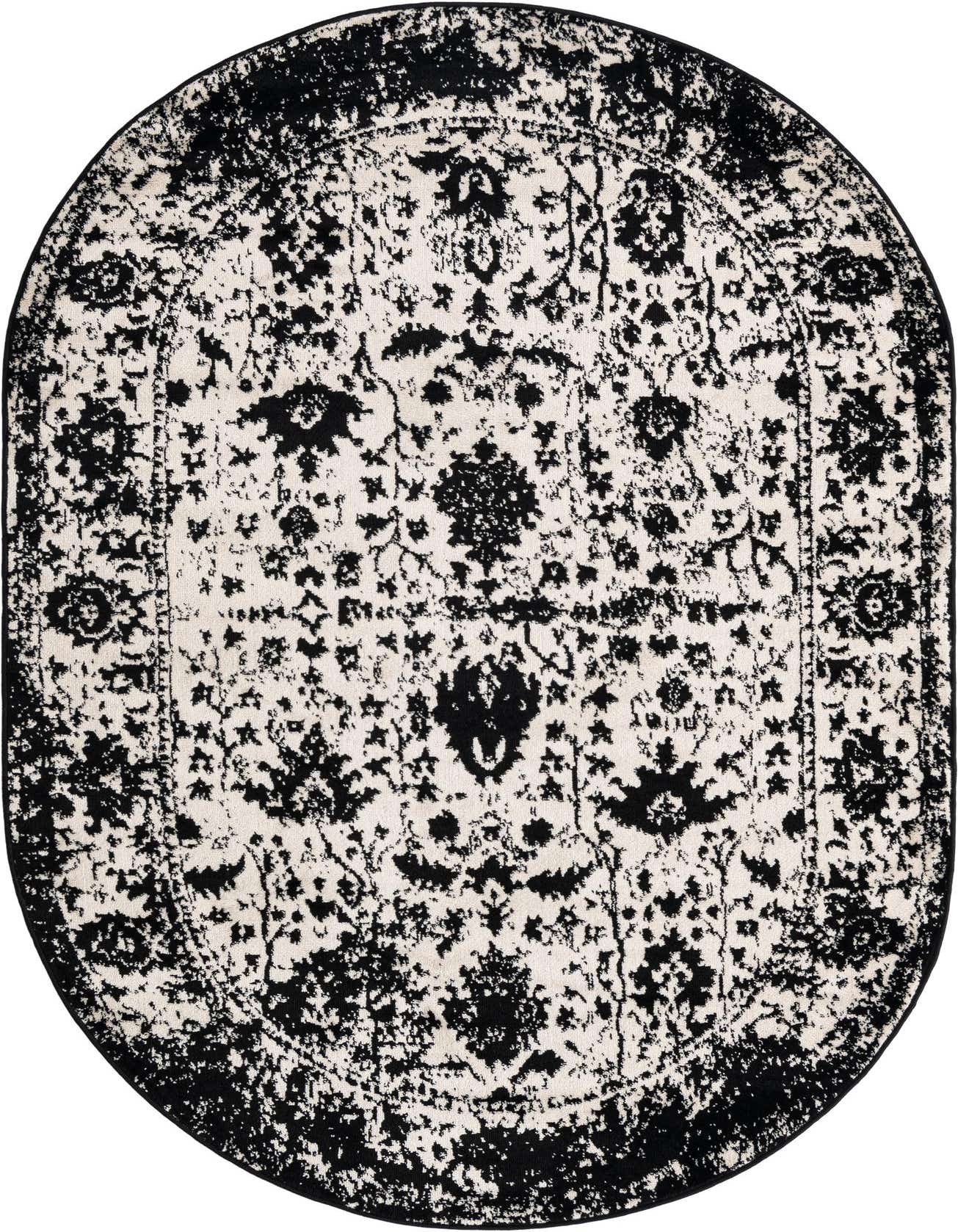 An oval black and white distressed floral rug with a traditional pattern, suitable for a living room or bedroom.