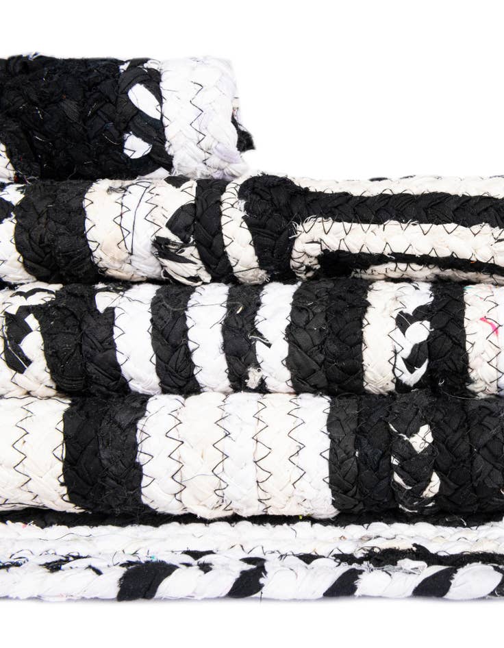 Detail image of  6' 1 x 9'  Hand Braided Chindi Rug