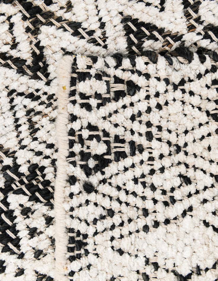 Detail image of  2' 2 x 3' 2  Hand Woven Chindi Braided Jute Rug