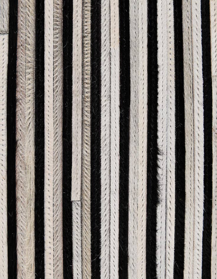 Detail image of  5' 2 x 8' Cowhide - Patchwork Rug