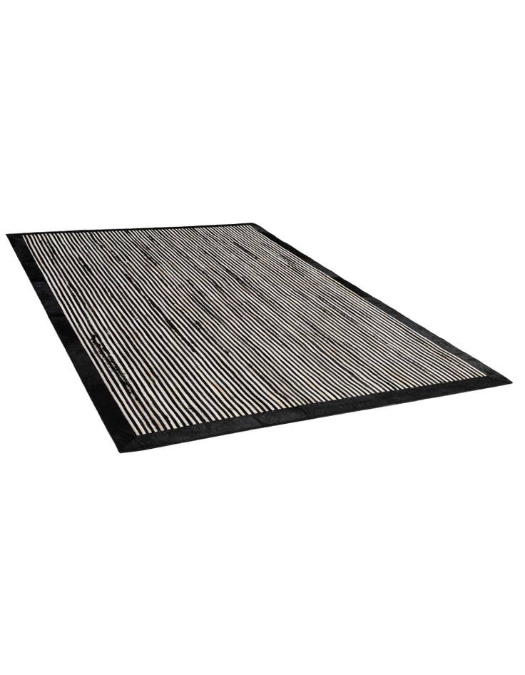 Detail image of  5' 1 x 7' 11 Cowhide - Patchwork Rug