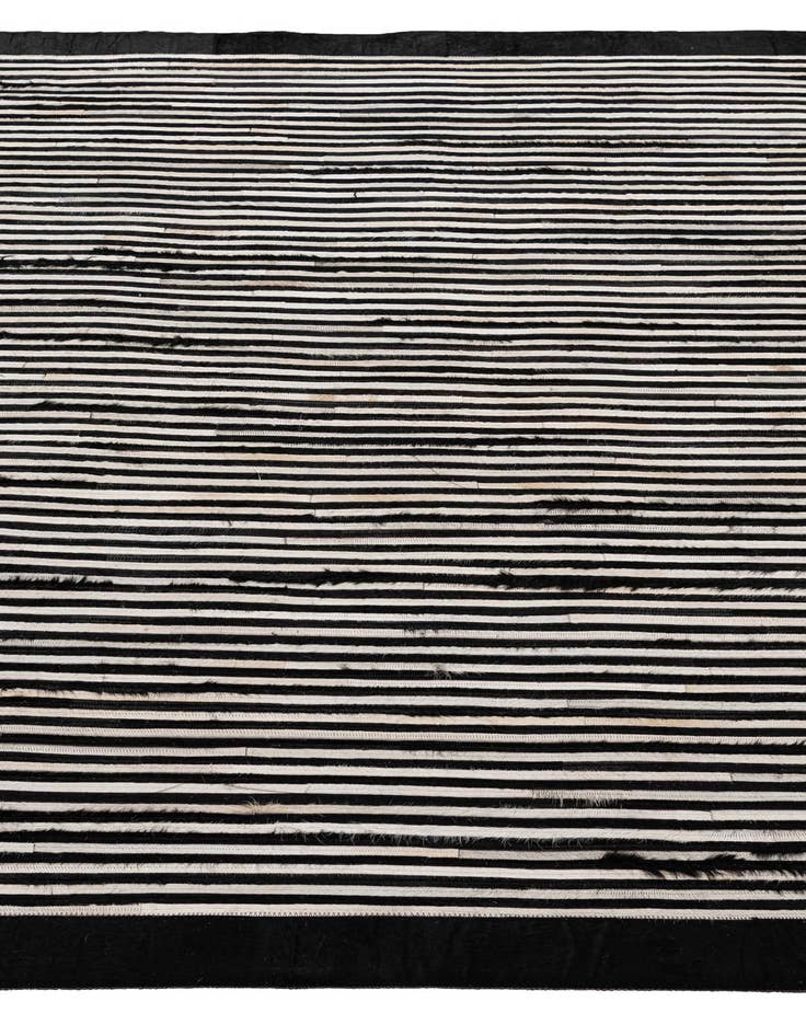 Detail image of  5' 1 x 7' 11 Cowhide - Patchwork Rug