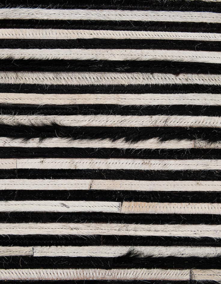 Detail image of  5' 1 x 7' 11 Cowhide - Patchwork Rug