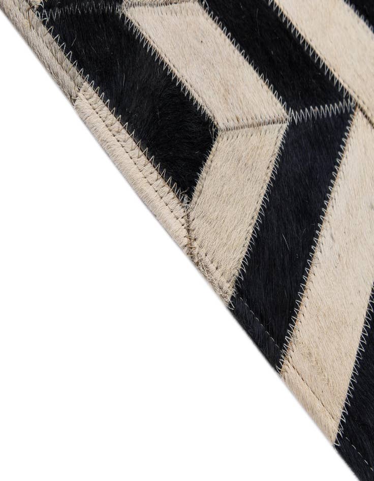 Detail image of  4' 2 x 6' 1 Cowhide - Patchwork Rug