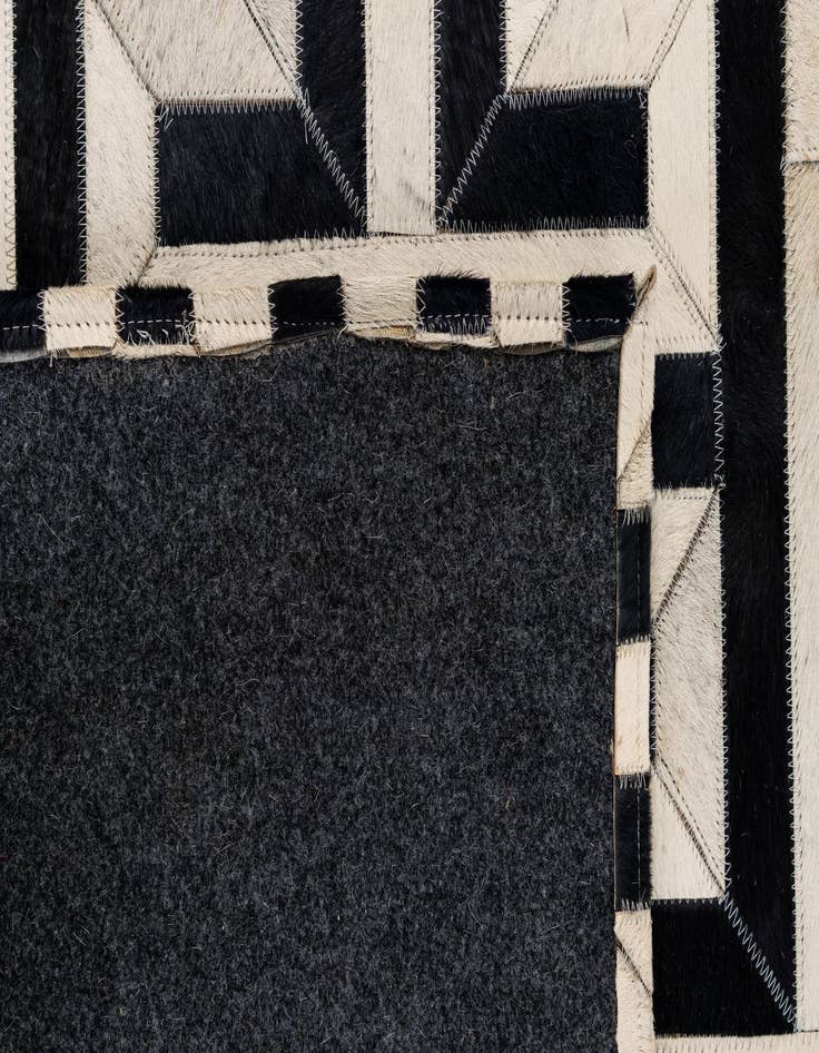 Detail image of  4' 2 x 6' 1 Cowhide - Patchwork Rug