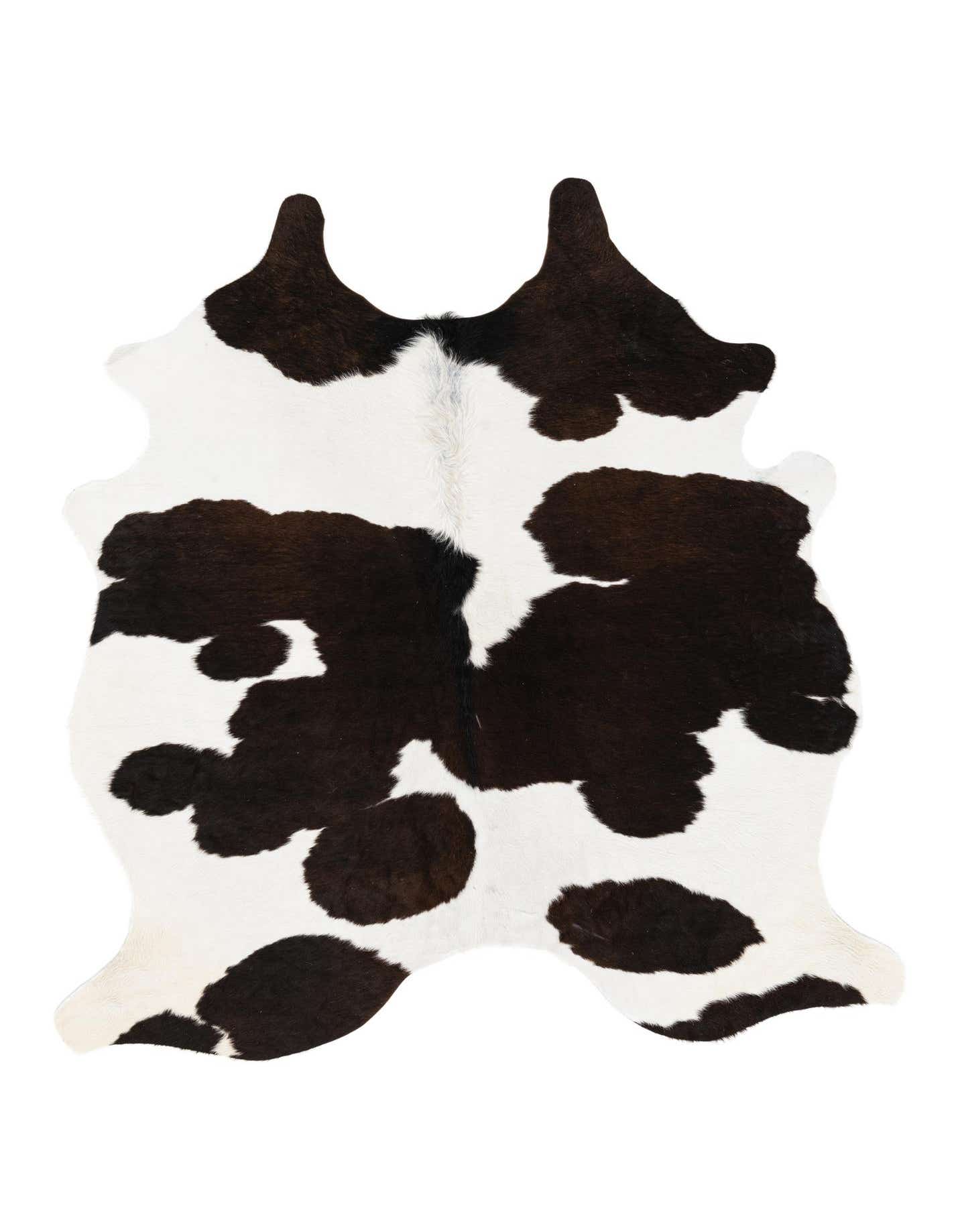 A 4x6 rectangular cowhide rug with an irregular shape, featuring a natural black and white spotted pattern, ideal for a modern living room.