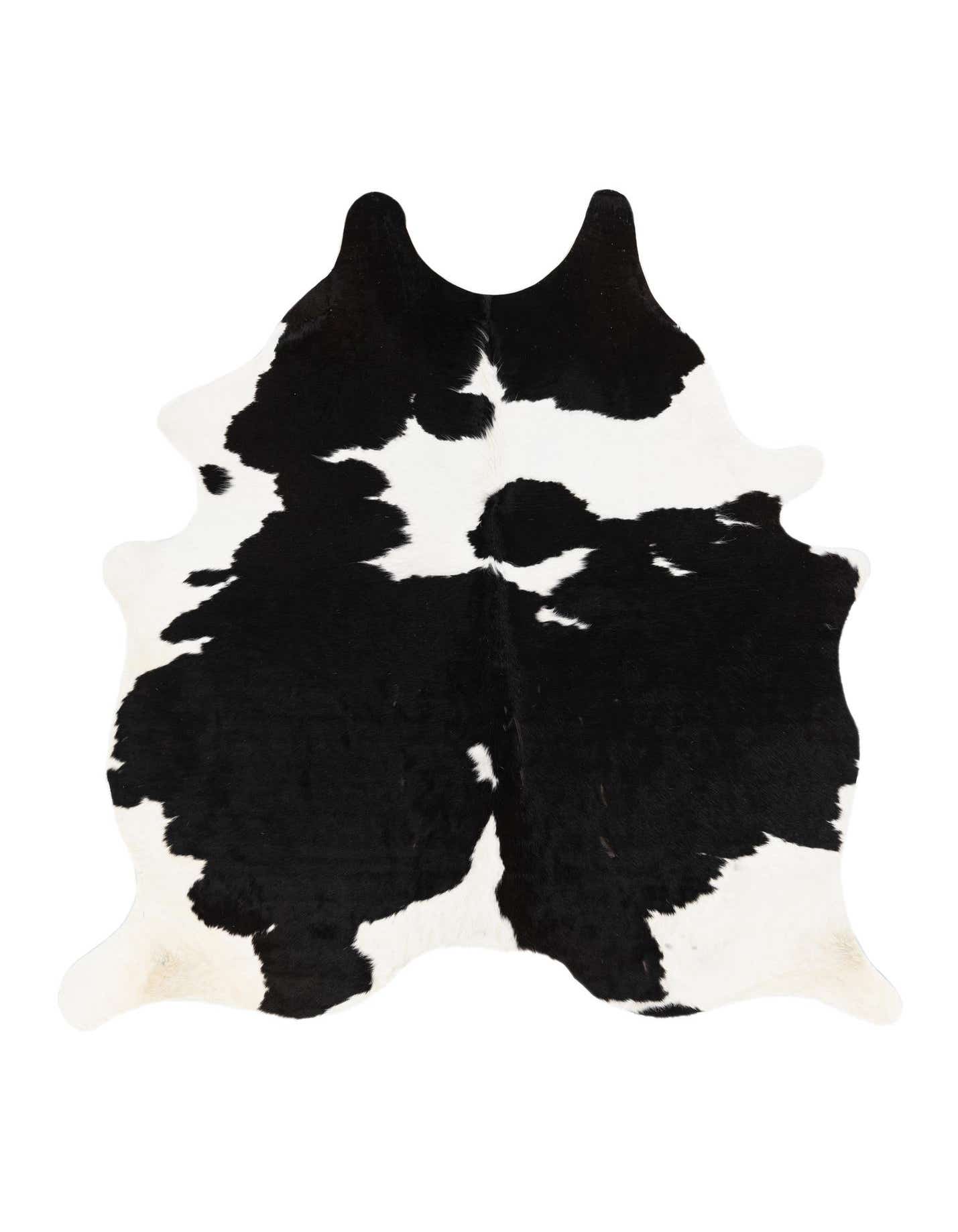 A 5x7 black and white cowhide rug with an irregular, natural shape, featuring bold black patches on a white background, suitable for a modern living space.