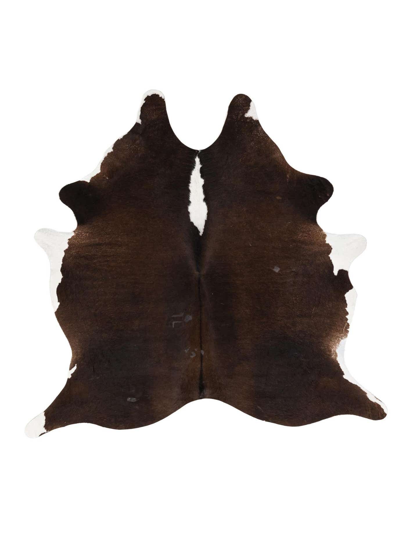 A 5x7 rectangular cowhide rug with a natural, irregular shape, featuring rich dark brown fur with prominent white patches, ideal for a modern living space.