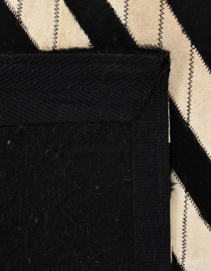 Detail image of  2' 1 x 3' 1 Cowhide Rug