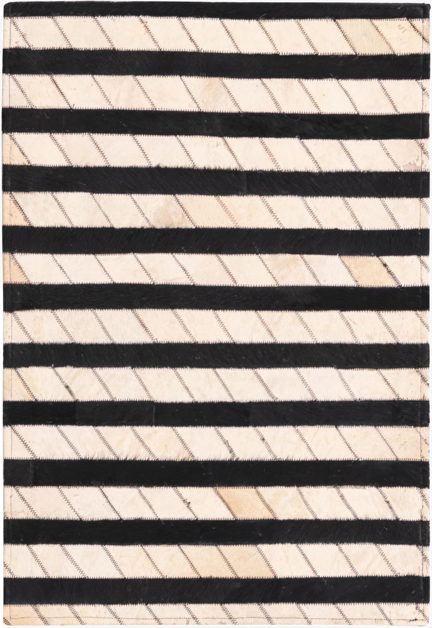  2' 1 x 3' 1 Cowhide Rug