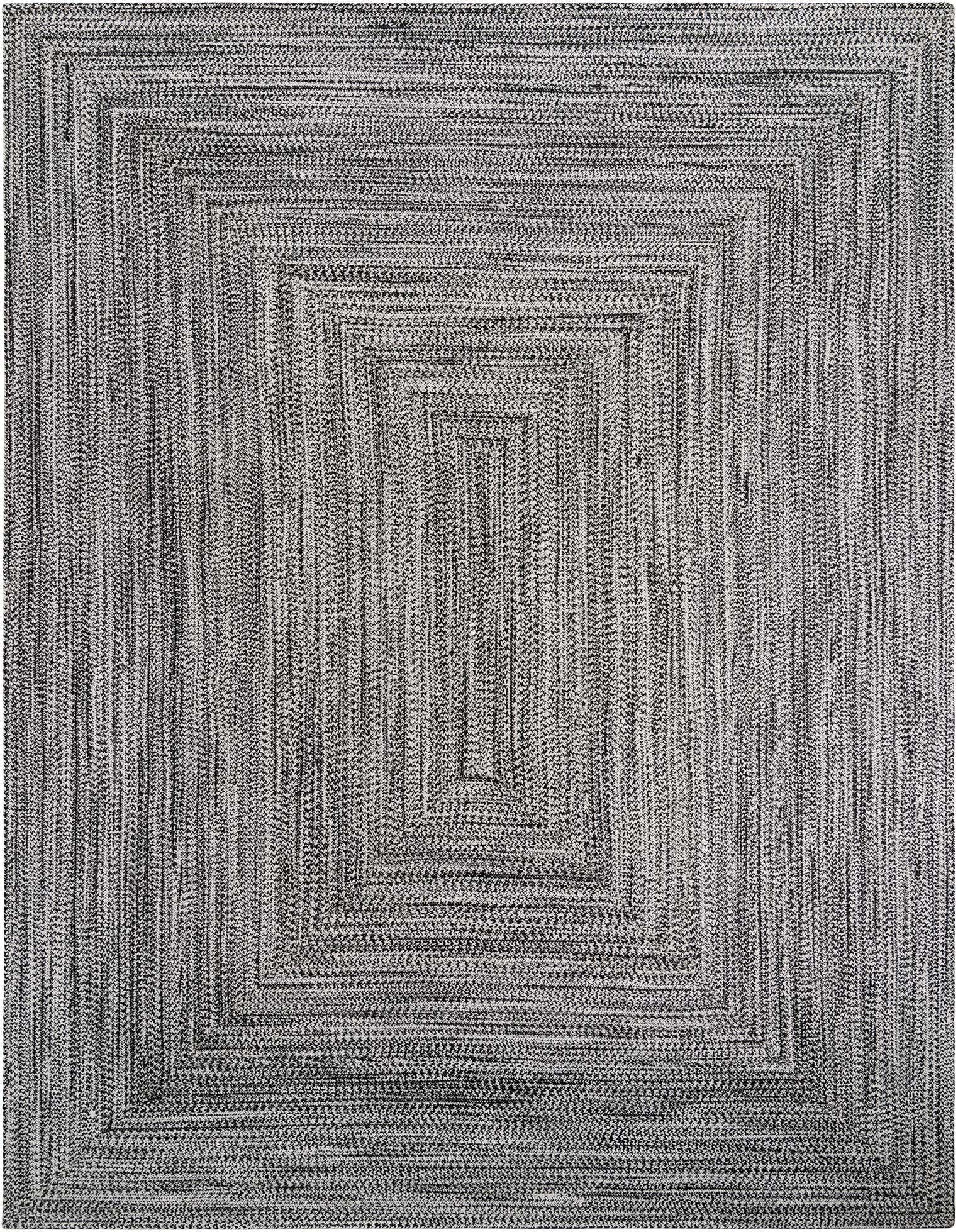 A 9x12 rectangular black and white braided rug with a modern striped pattern, suitable for indoor or outdoor use.