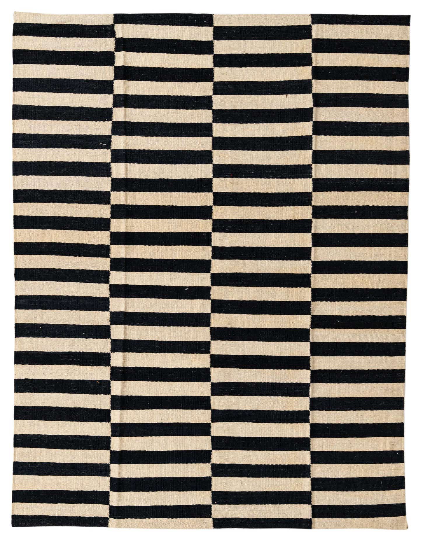 A 5x8 rectangular Kilim Modern rug with a bold black and cream striped pattern, handmade from wool.