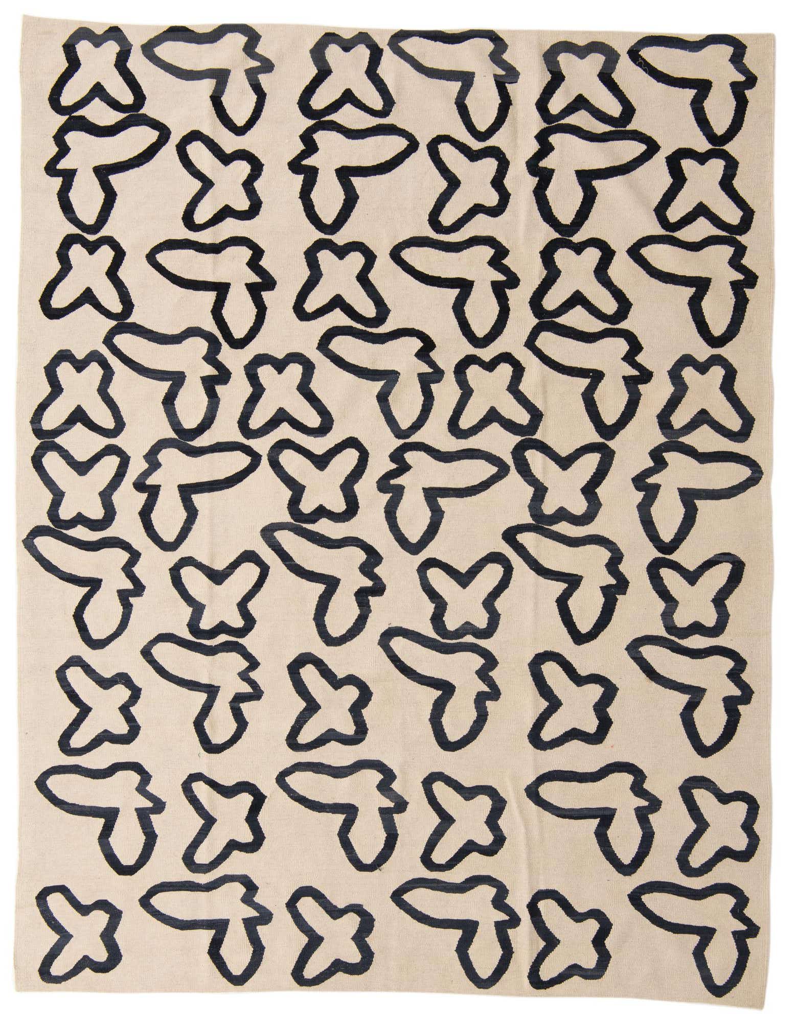 An 8x10 rectangular flatweave rug featuring a bold, abstract black tribal pattern on an ivory background.