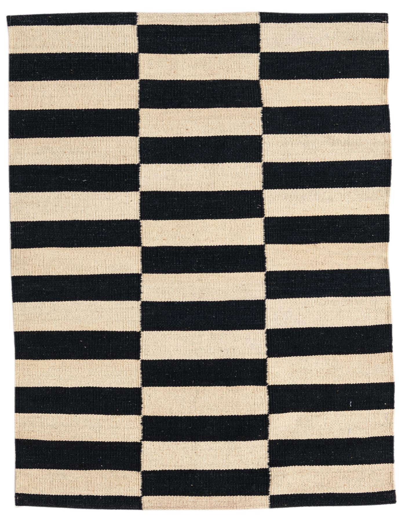 A 3x4 rectangular flatweave rug featuring a bold black and ivory striped pattern, ideal for a modern or tribal-inspired indoor space.