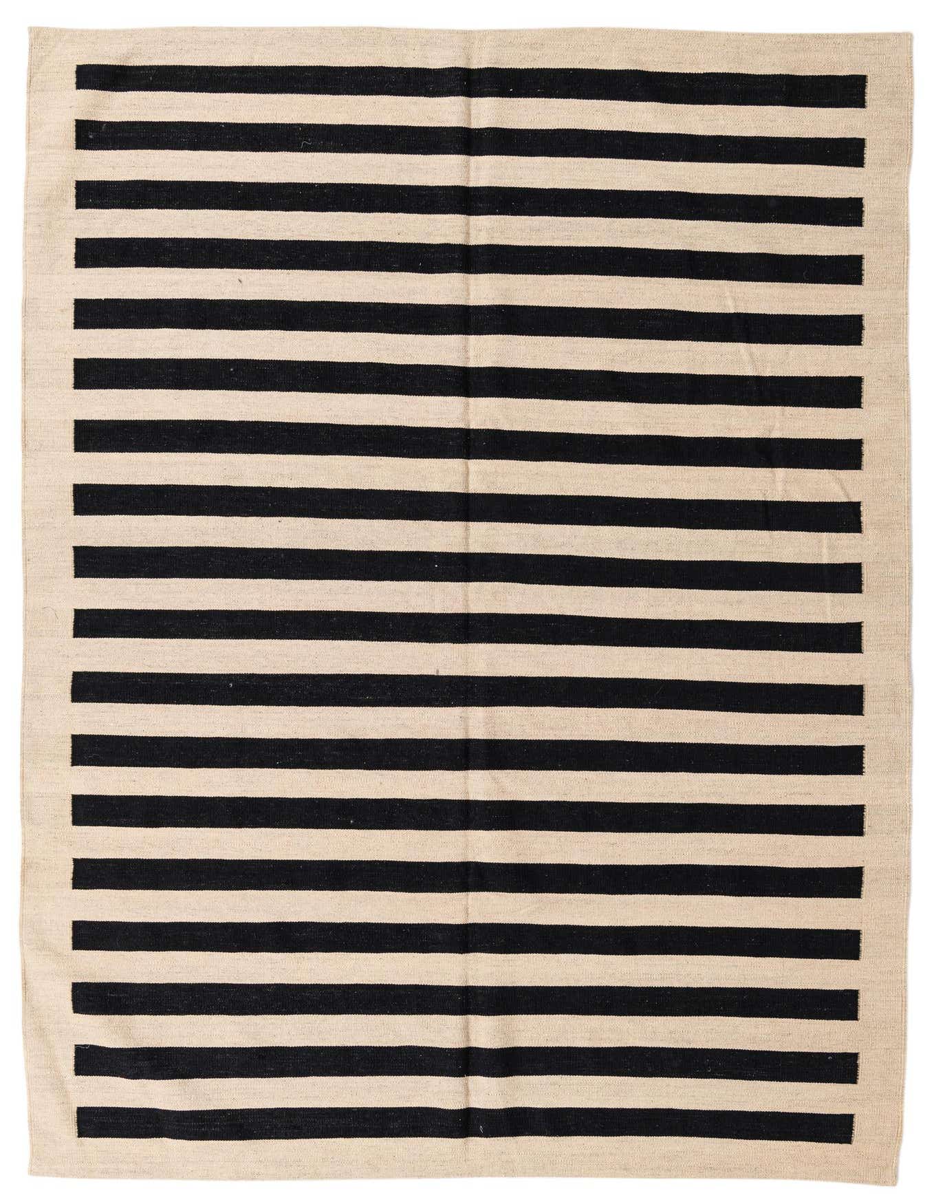 A 7x10 rectangular flatweave rug with bold black and cream horizontal stripes, suitable for a modern living room.