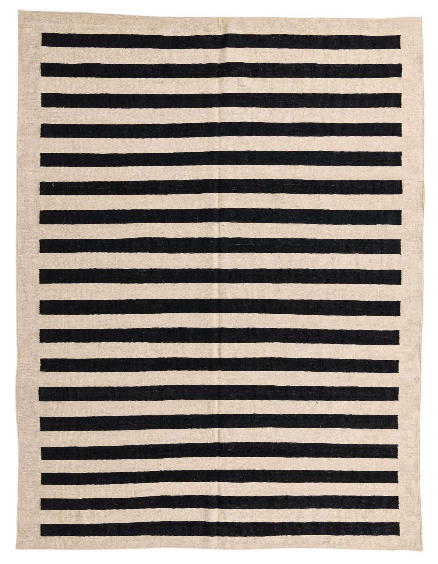 A 7x10 rectangular flatweave wool rug with bold black and cream horizontal stripes, suitable for a modern living room.