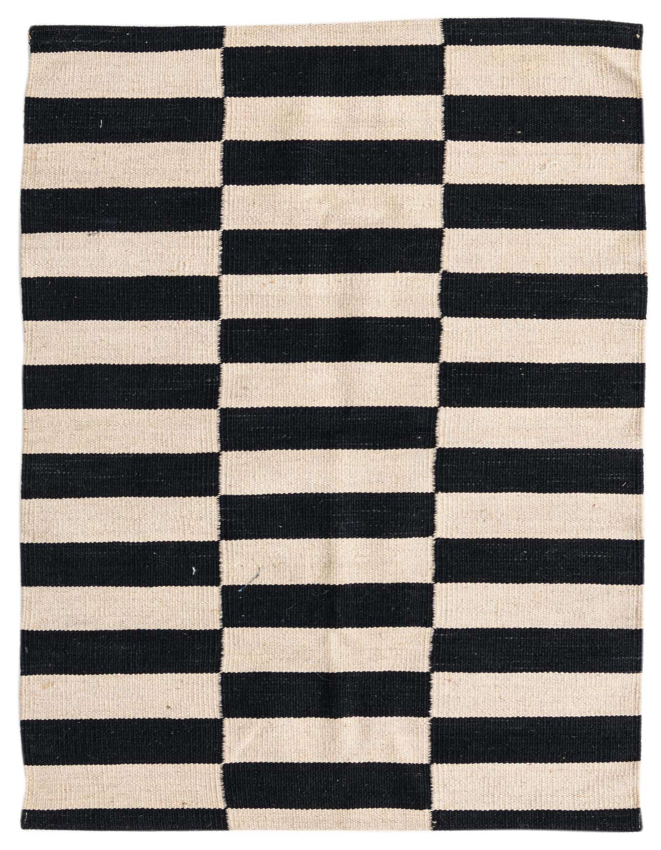 A 3x4 rectangular black and ivory flatweave wool rug with a bold striped, modern tribal pattern.