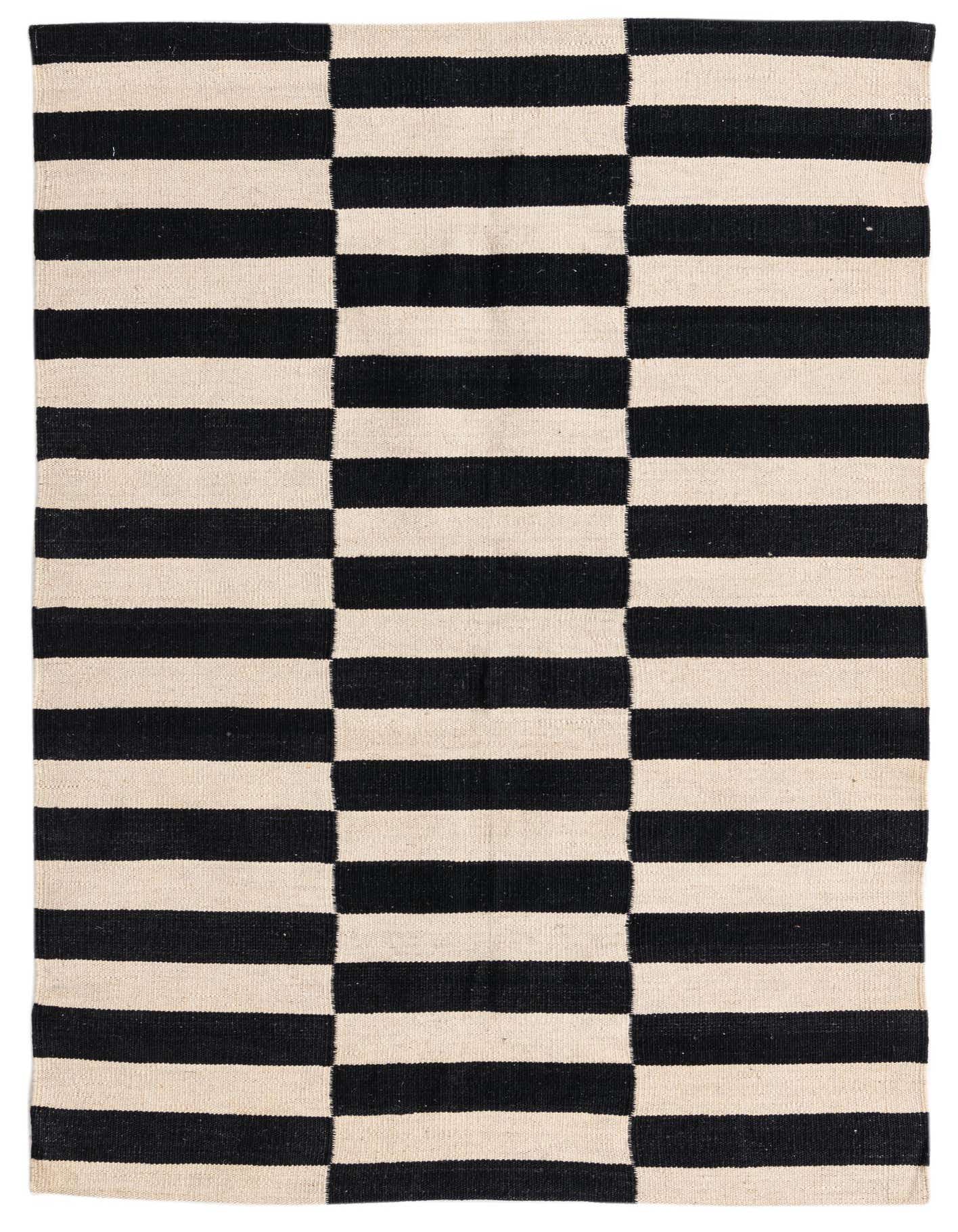 A 3x5 rectangular Kilim Modern rug with a bold black and ivory striped pattern, perfect for a kitchen or entryway.