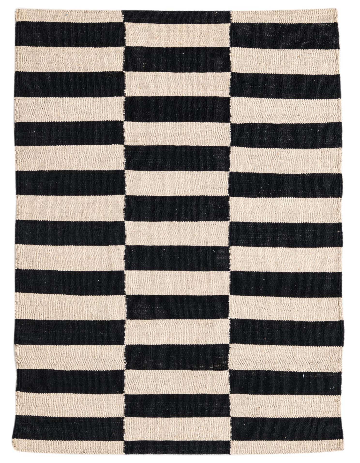 A 3x4 rectangular flatweave rug featuring a bold black and ivory striped geometric pattern, ideal for modern or tribal decor.