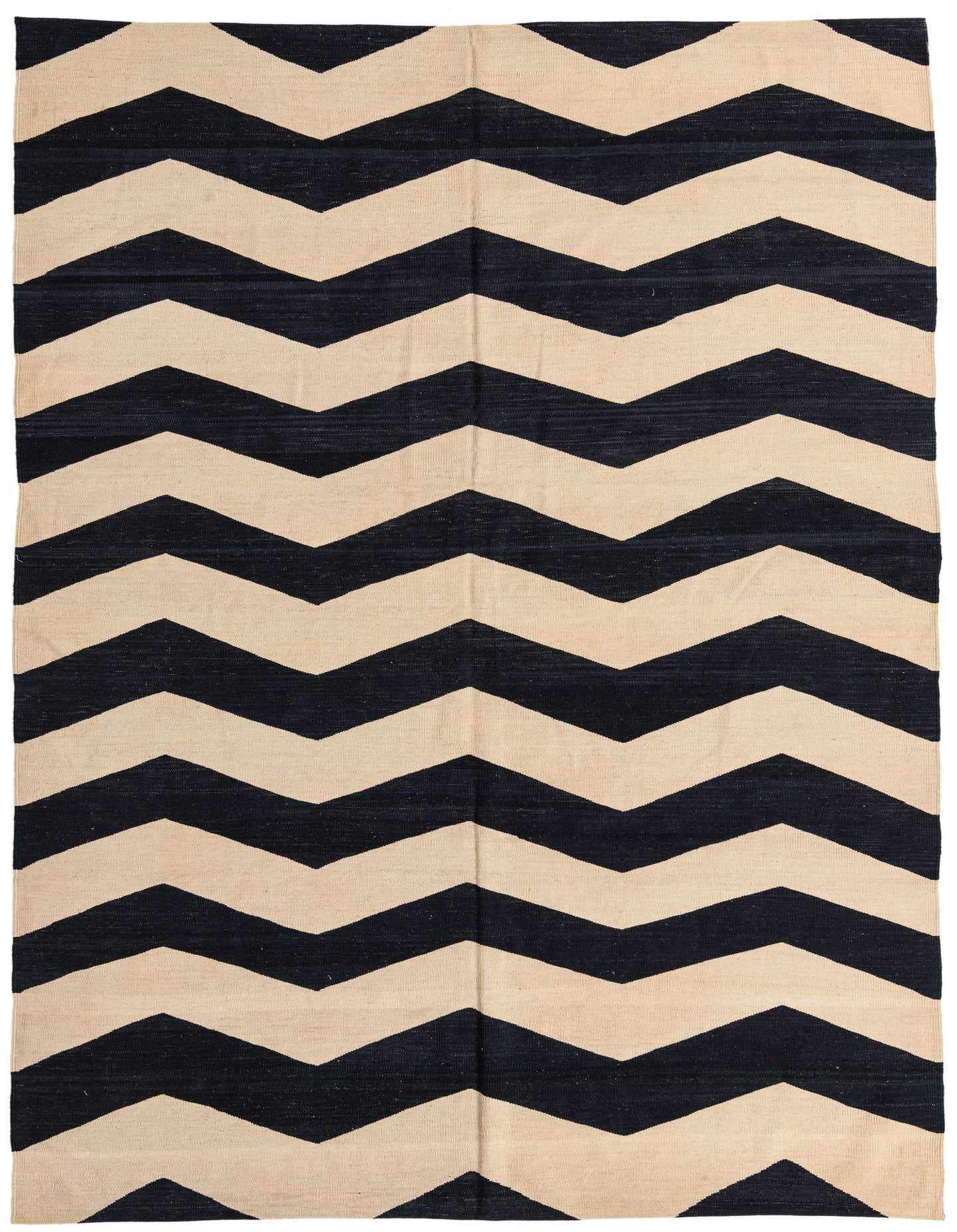 A 7x10 rectangular flatweave rug featuring a bold black and cream chevron pattern, suitable for a modern living room.