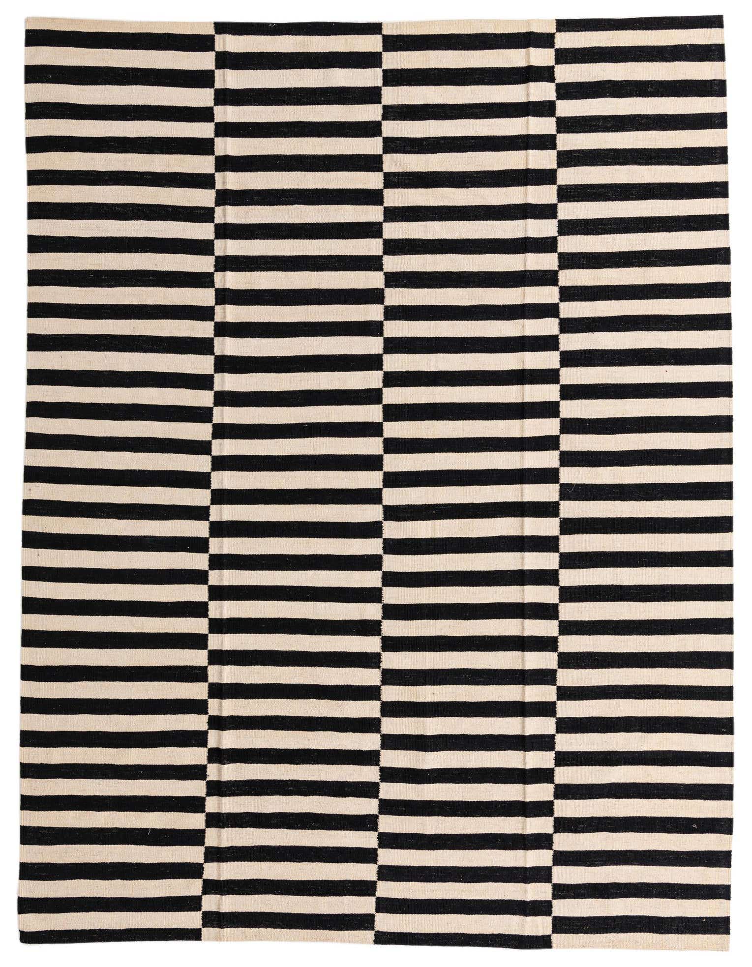 A rectangular 8x11 black and white striped flatweave rug with a modern tribal pattern, suitable for a living room.
