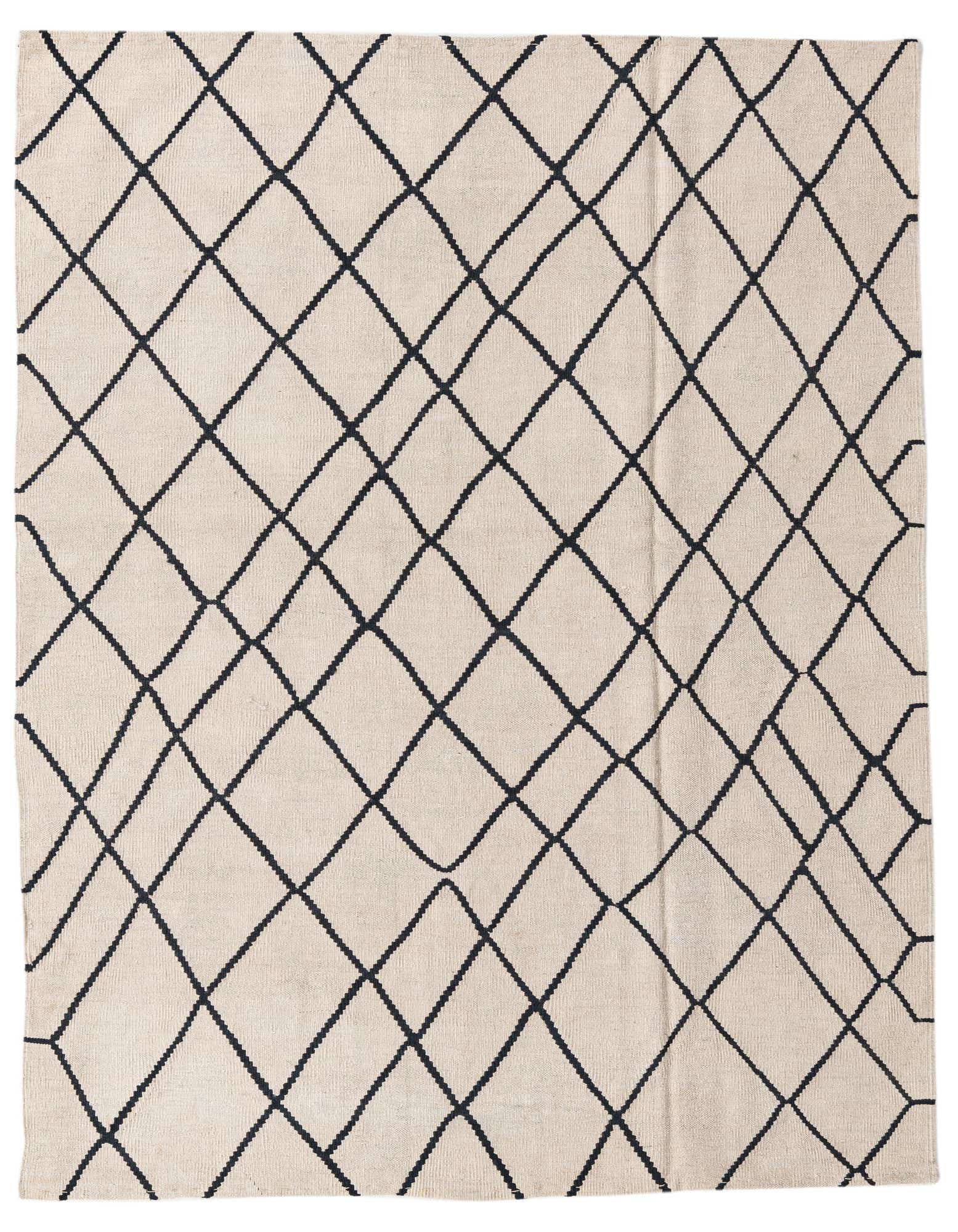 A 5x8 rectangular black and ivory flatweave wool rug with a modern tribal diamond pattern, ideal for a living room.