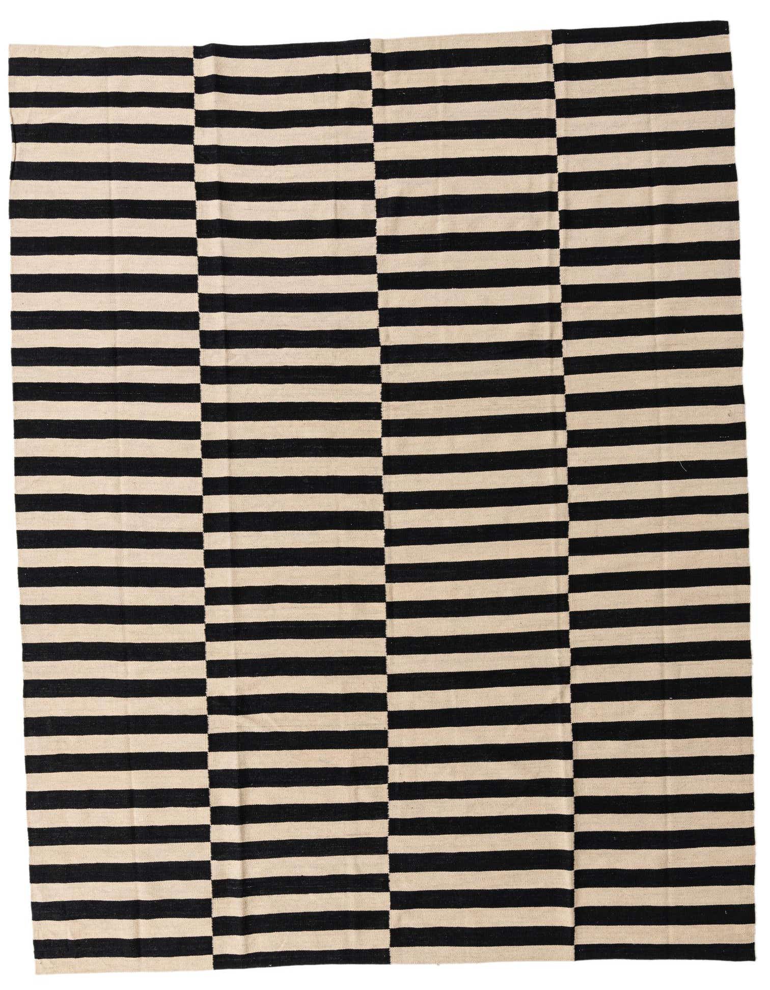 An 8x11 rectangular Kilim Modern rug with a bold black and cream striped tribal pattern, suitable for a living room.