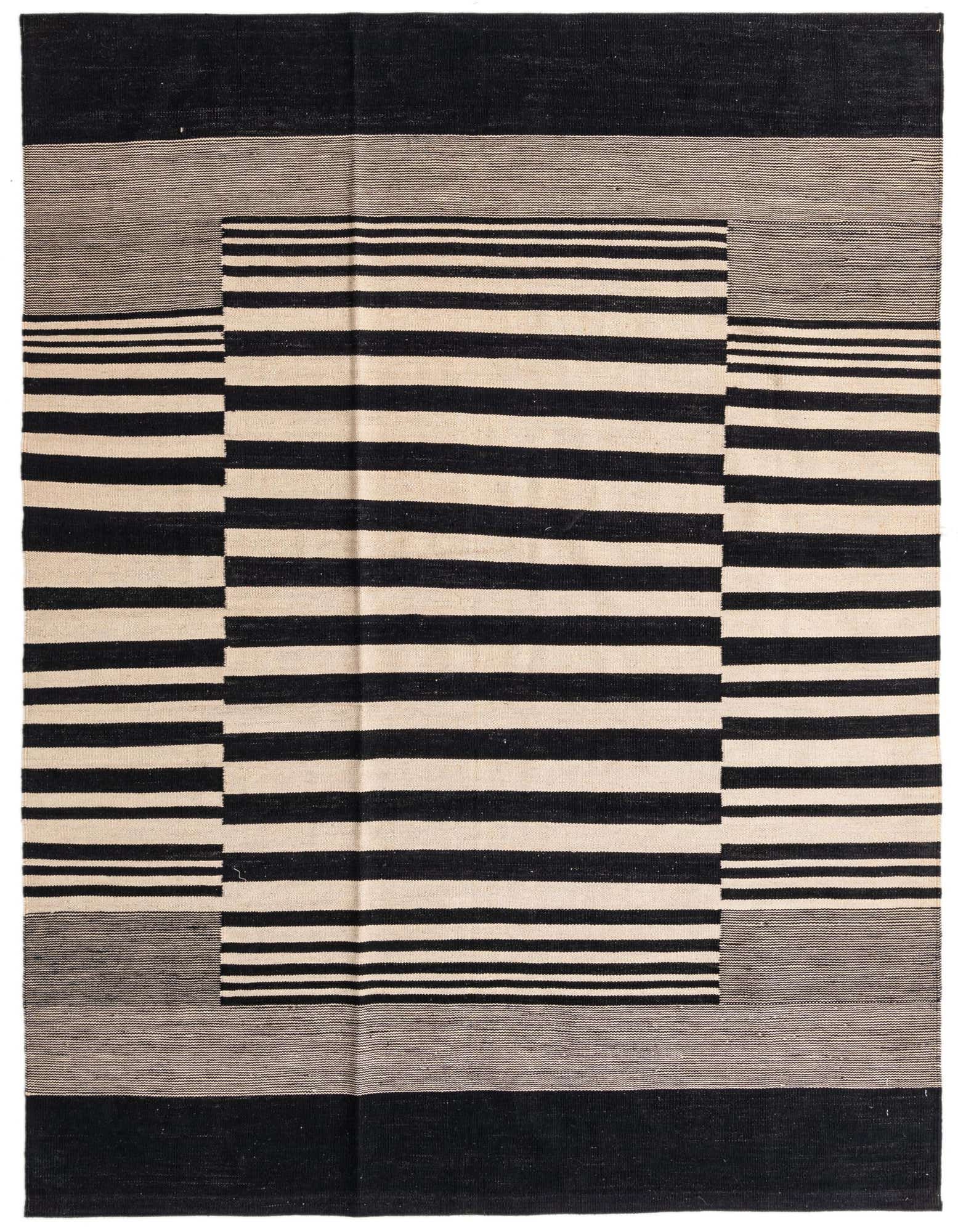 A 6x9 rectangular Kilim Modern rug with a bold black and ivory striped tribal pattern, featuring a flatweave texture.