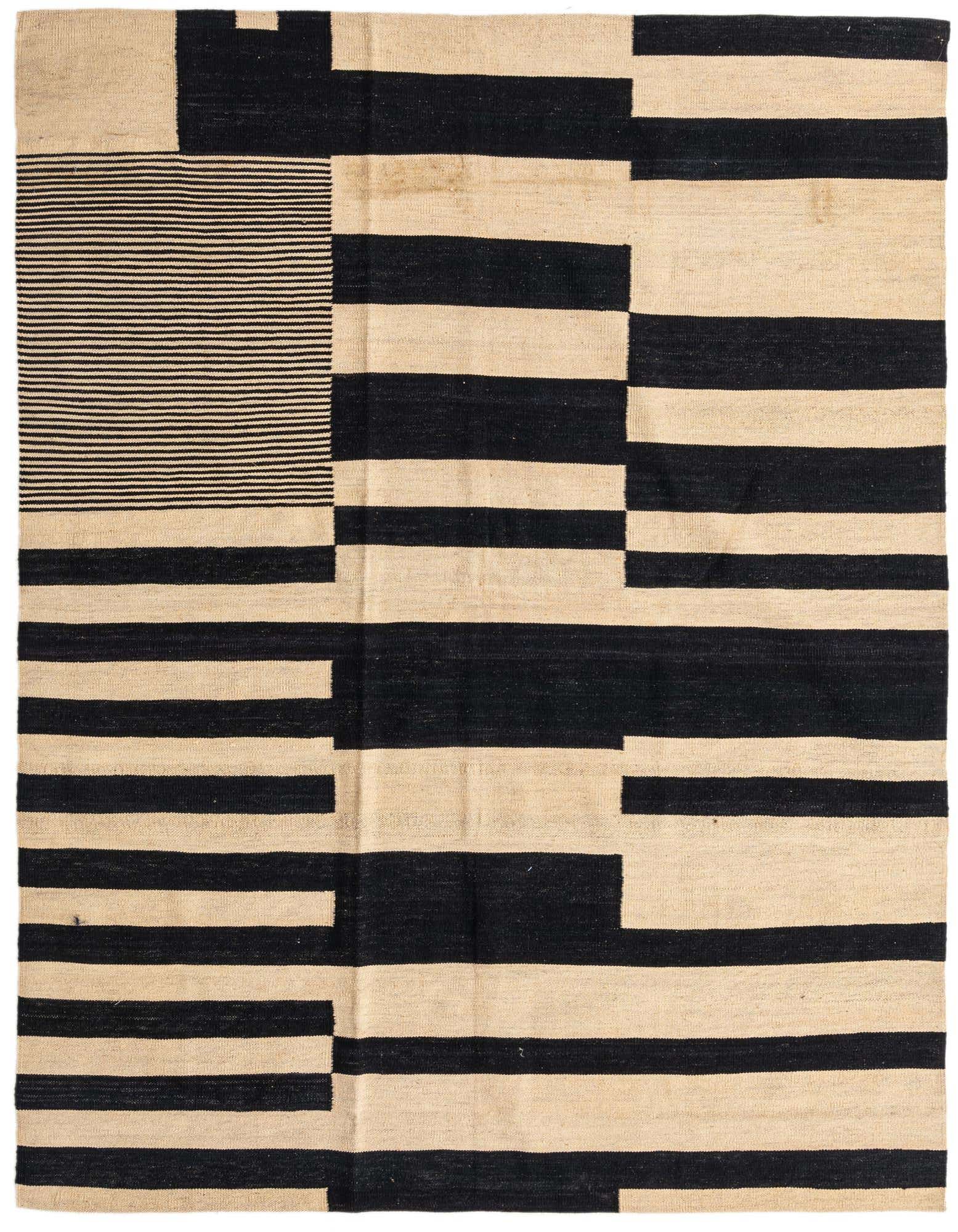 A 5x8 rectangular Kilim Modern rug with a bold black and ivory stripe and geometric tribal pattern, handmade from wool.