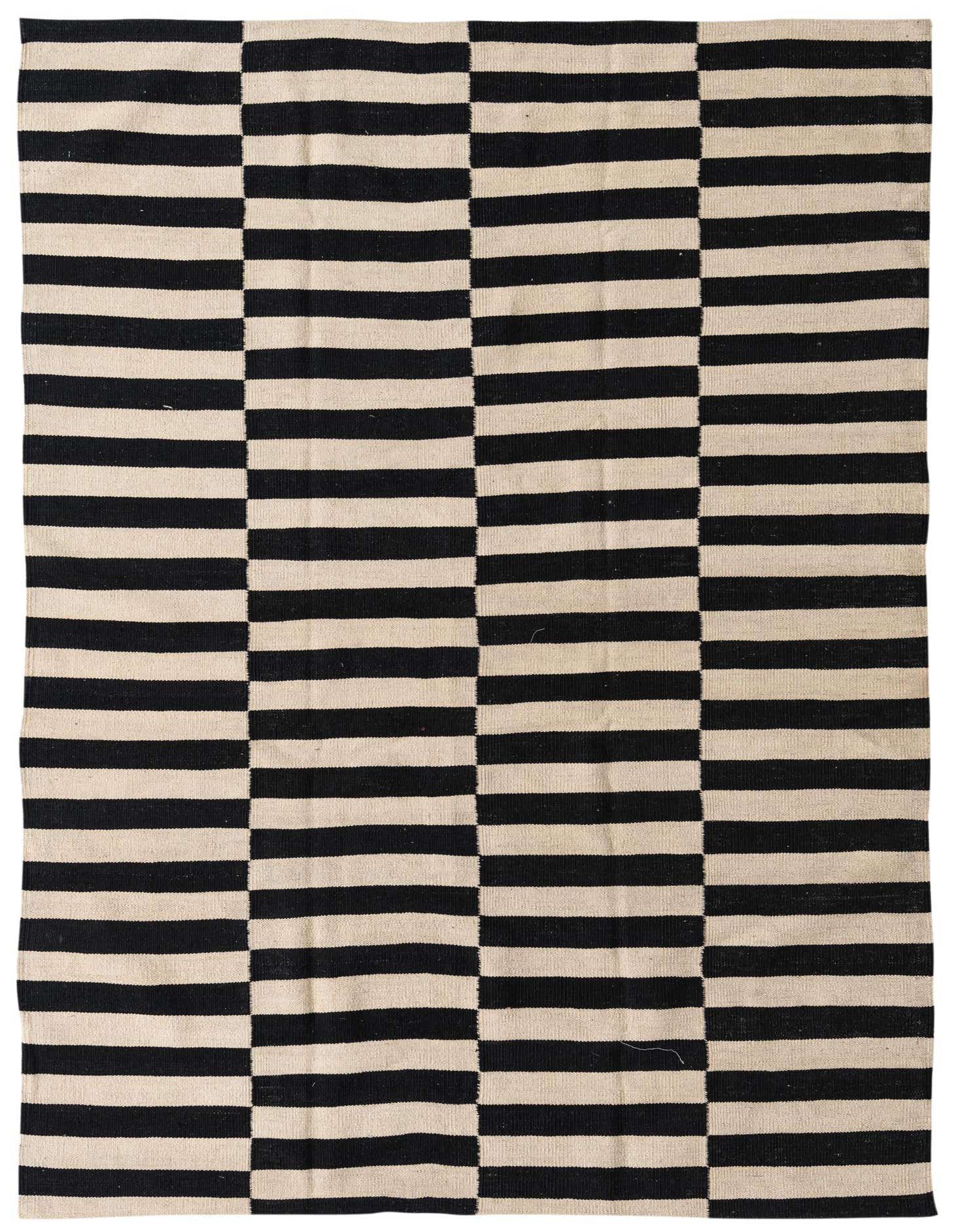 A 5x8 rectangular Kilim Modern rug with a bold black and cream striped tribal pattern, suitable for a living room.