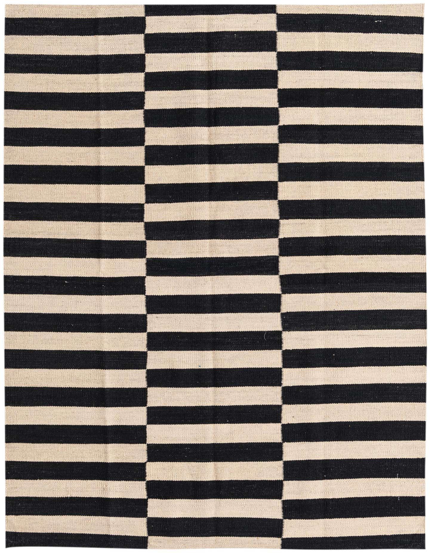 A 4x6 rectangular black and ivory striped flatweave wool rug with a modern tribal pattern.