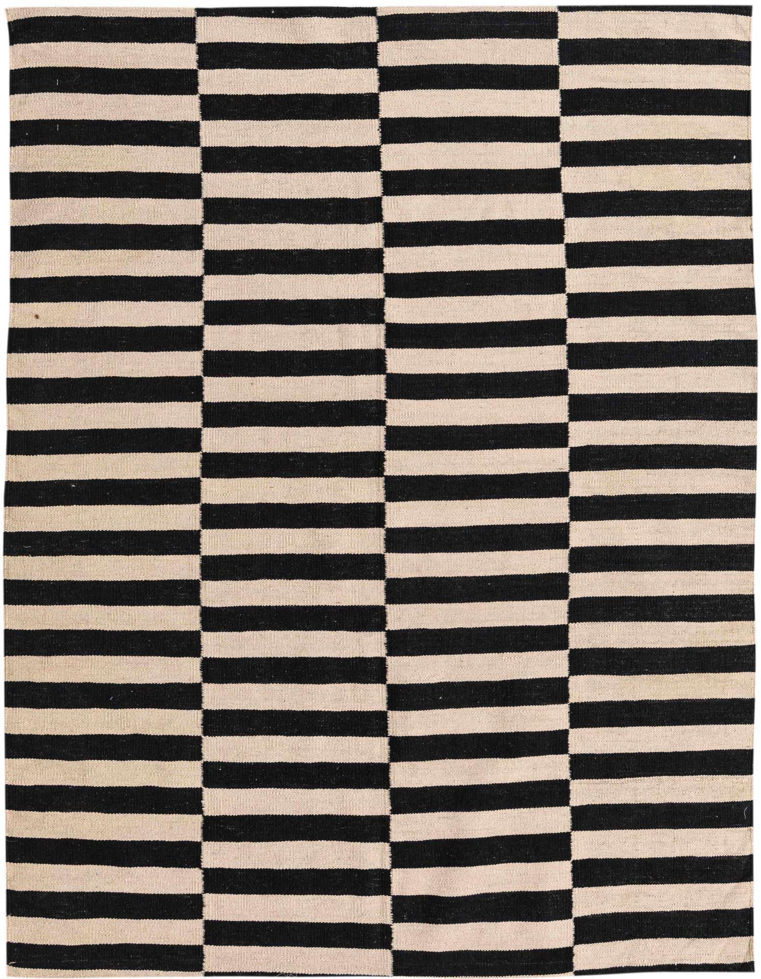 A 5x8 rectangular black and ivory flatweave rug with a bold, modern striped pattern, ideal for a living room.