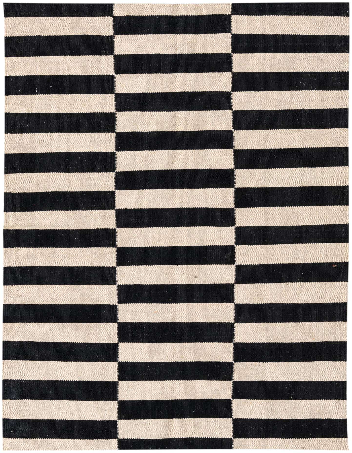 A 3x5 rectangular Kilim Modern rug with a bold black and ivory striped pattern, featuring a unique staggered block design.