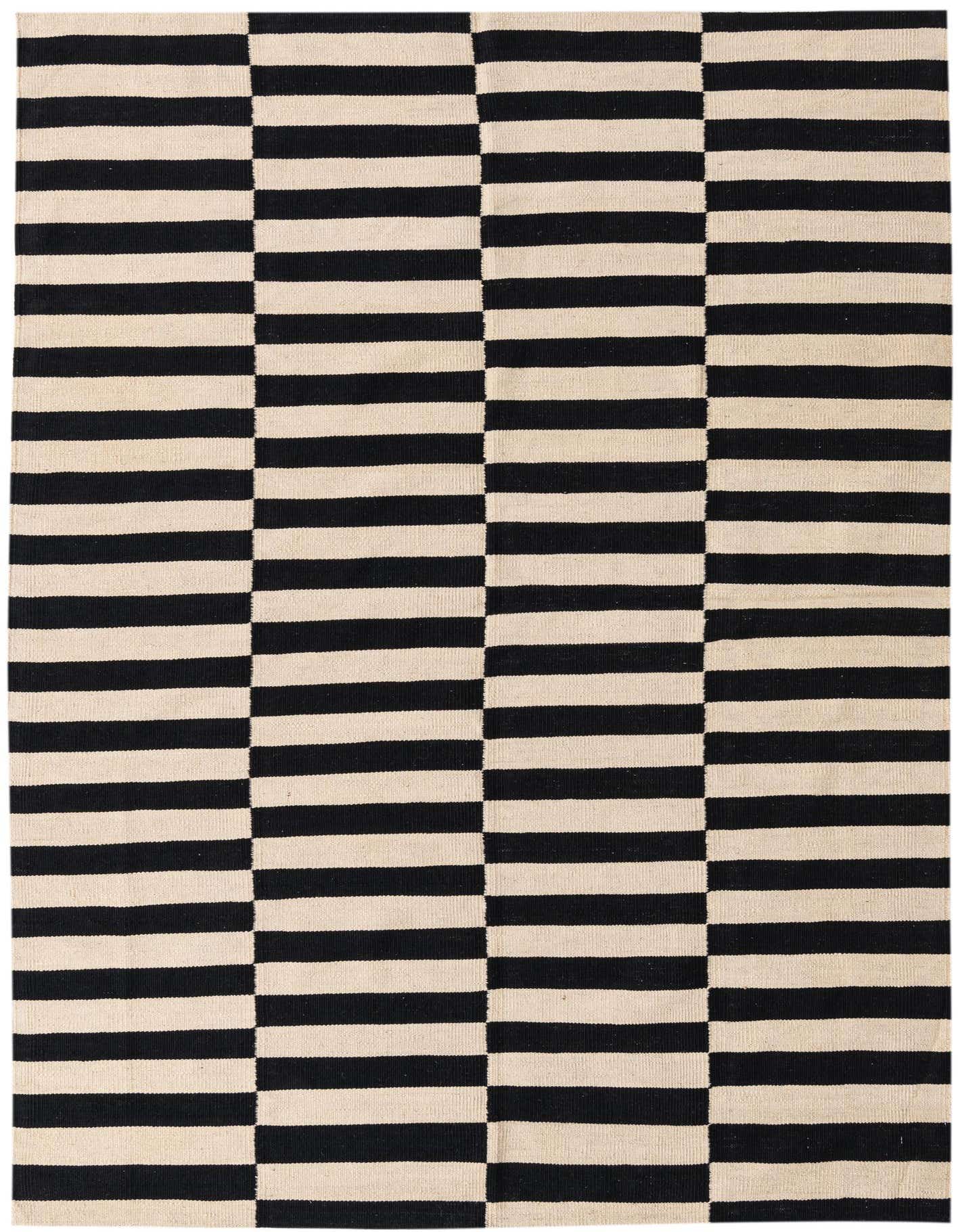 A 5x8 rectangular black and cream flatweave rug with a bold, modern striped pattern, ideal for a living room.