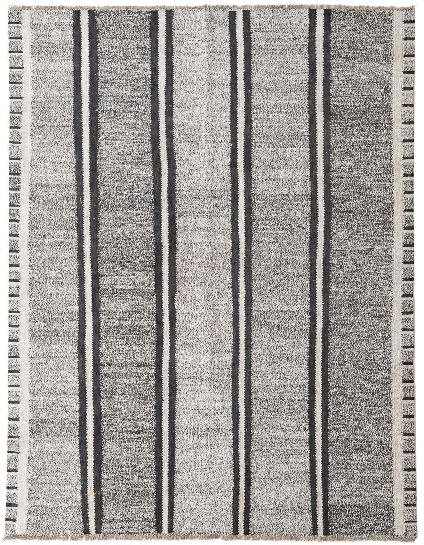 A 5x8 rectangular Kilim Modern rug with a flatweave, featuring black and ivory stripes and a tribal border.