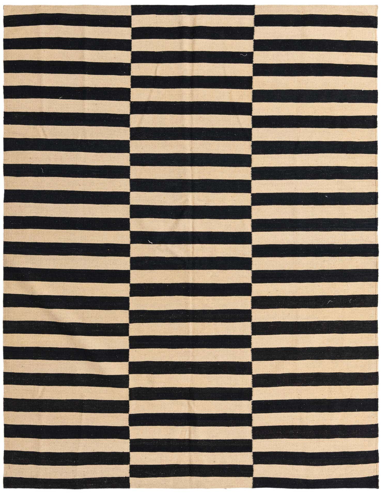 A 5x8 rectangular black and cream flatweave rug with a bold striped and color-blocked pattern, suitable for a modern living room.