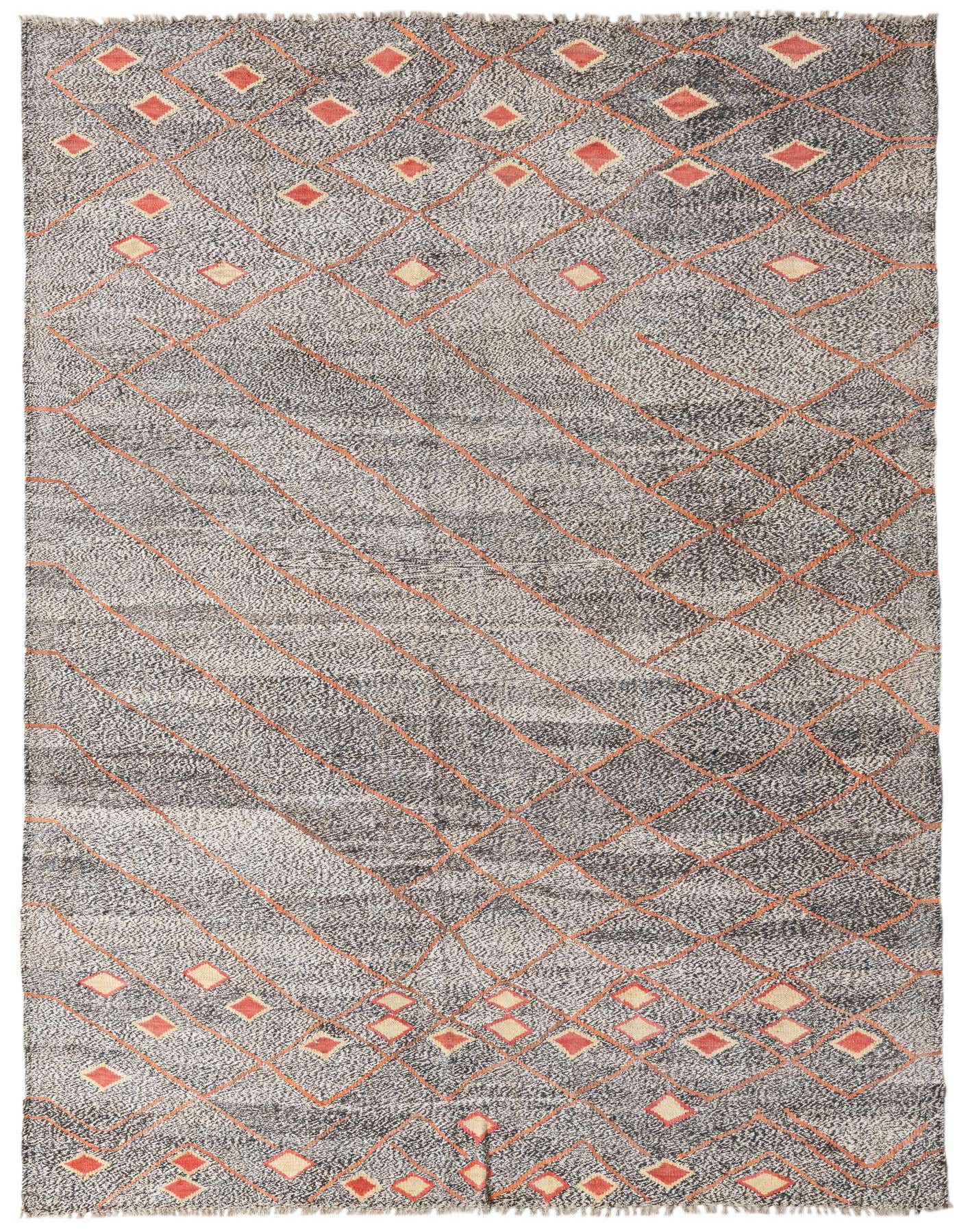 A 6x9 rectangular flatweave rug with a tribal modern pattern in shades of black, white, and ivory, featuring orange diamond and stripe accents.