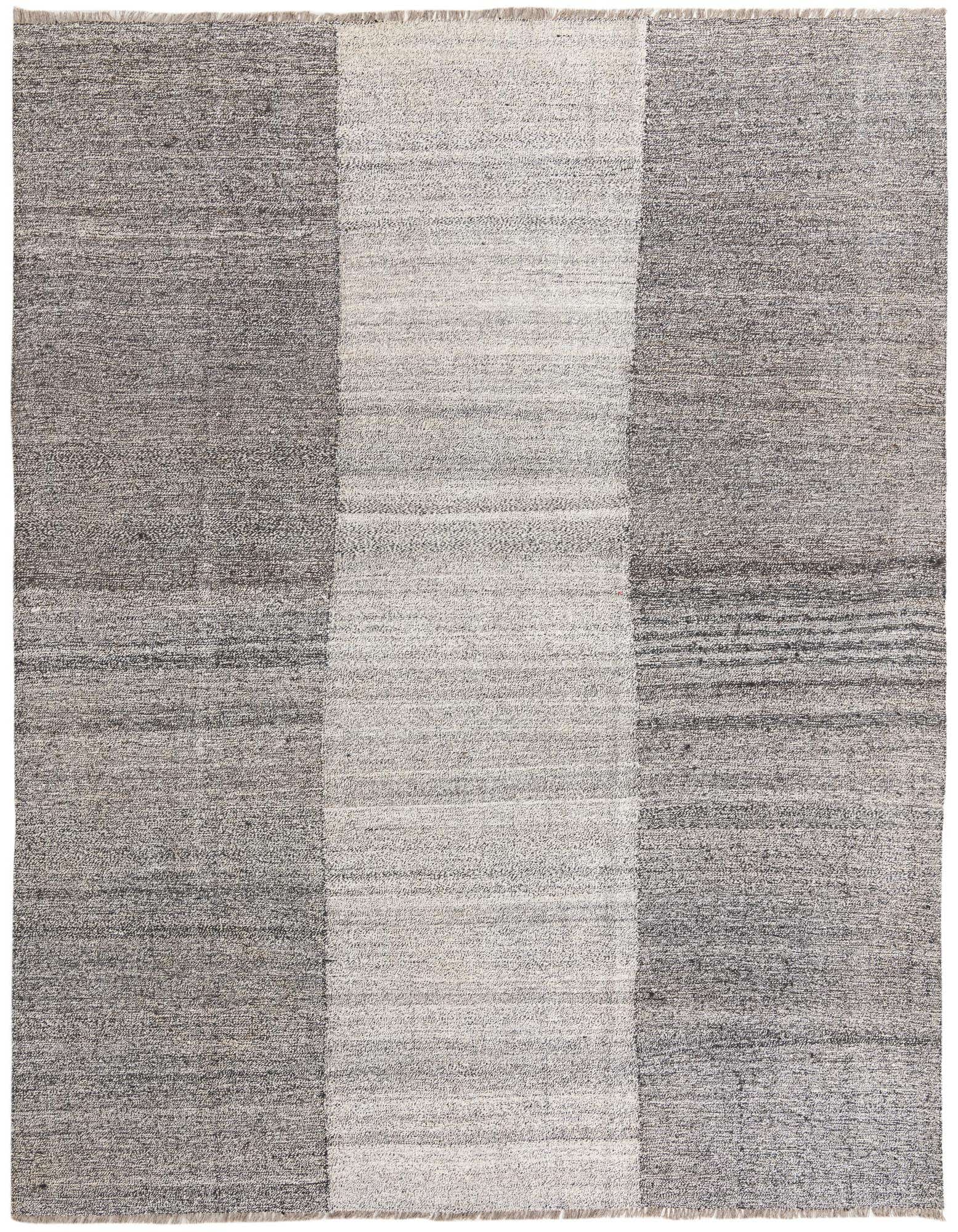 An 8x10 rectangular flatweave wool rug featuring wide vertical stripes in varying shades of black, white, and gray, showcasing a modern tribal design.